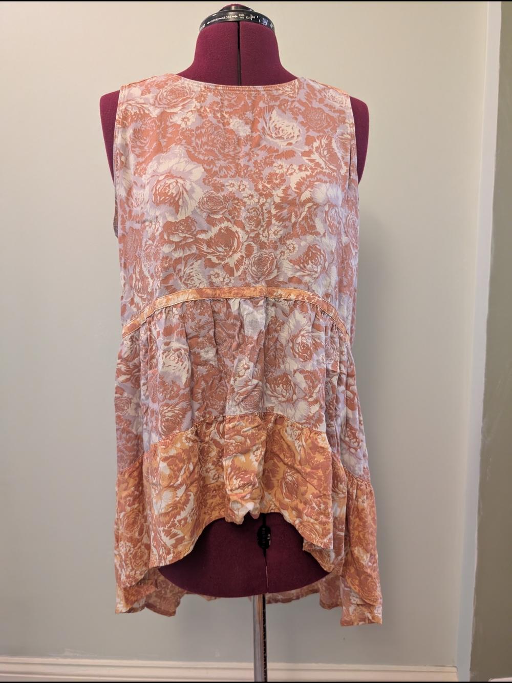 Maurices Peach and White Floral Sleeveless Peplum Tunic